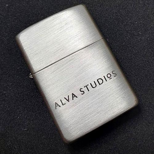 Solid silver Zippo with corporate branding front and reverse by machine