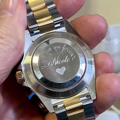 Hand engraved Rolex watch