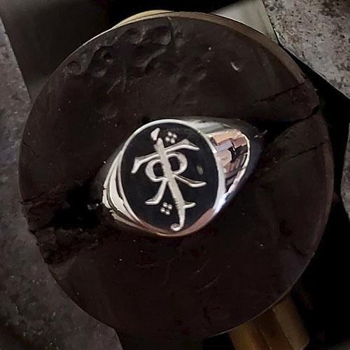 Client’s own motif reproduced and machine engraved onto silver signet ring