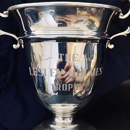 Machine engraved inscription on a large silver Grecian Urn shaped trophy